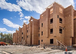 Developers sit on empty lots as higher rates delay projects